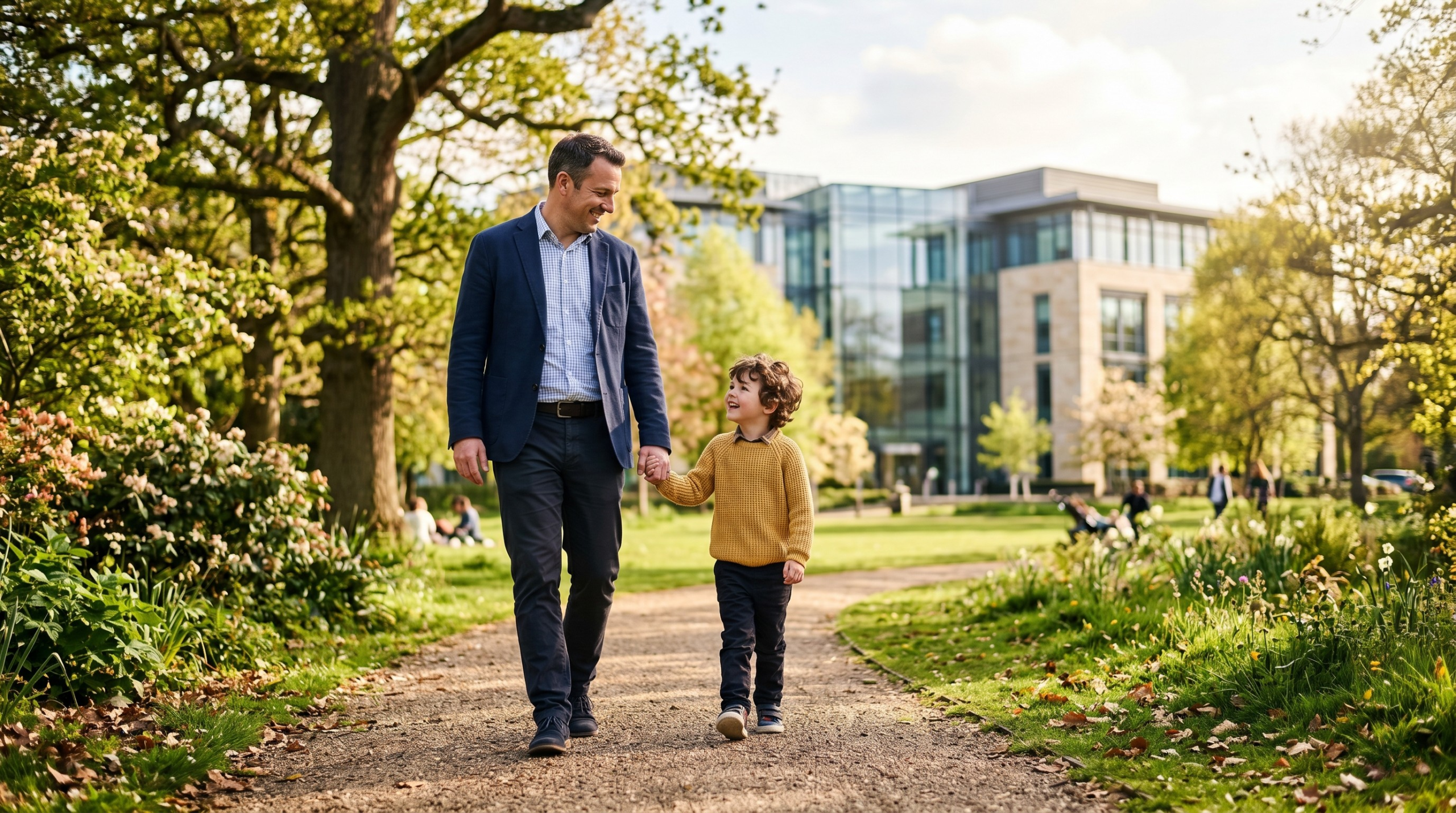 A father holding hands with his child, representing 50/50 shared care and child custody laws for fathers in the UK.
